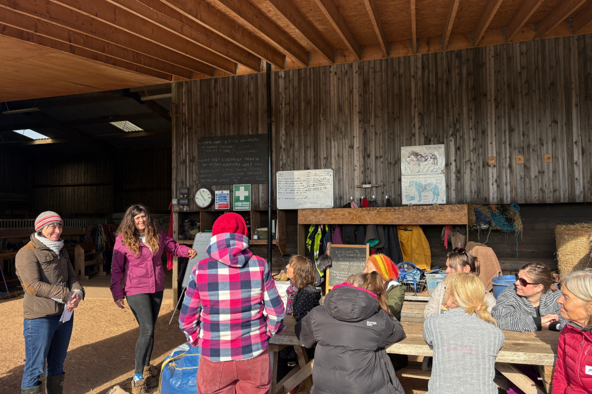 A group photo in Eat, Sleep, Ride stables
