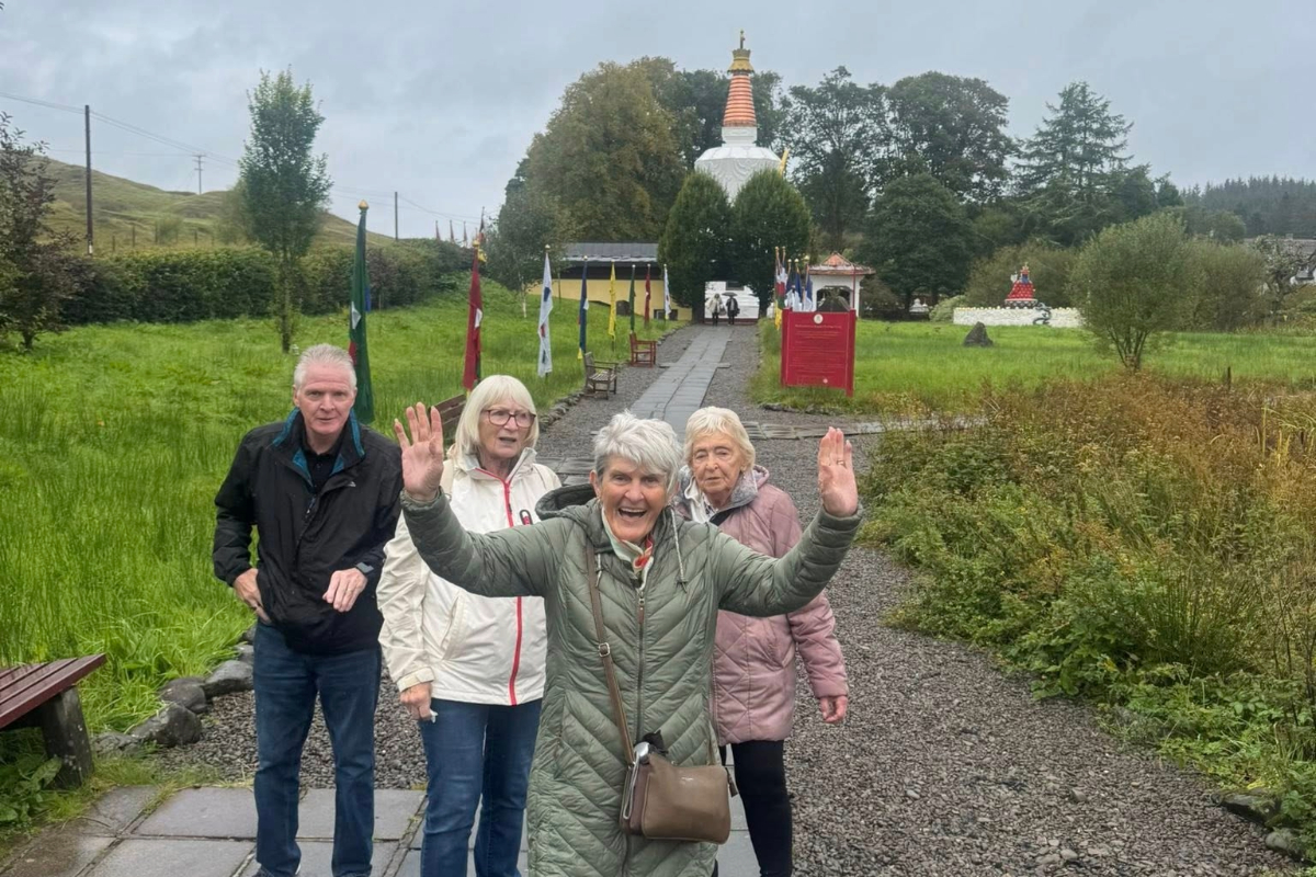 A group from dementia friendly meeting centres visiting Samye Ling